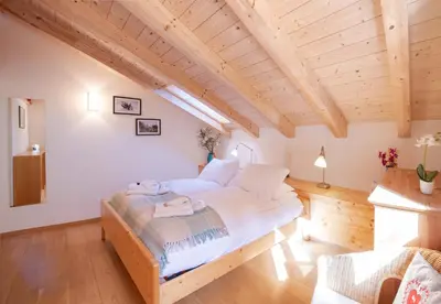 Ein Bett oder Betten in einem Zimmer der Unterkunft Chalet Stella Duplex Penthouse