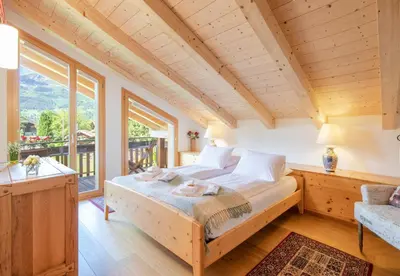 Ein Bett oder Betten in einem Zimmer der Unterkunft Chalet Stella Duplex Penthouse