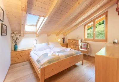 Ein Bett oder Betten in einem Zimmer der Unterkunft Chalet Stella Duplex Penthouse