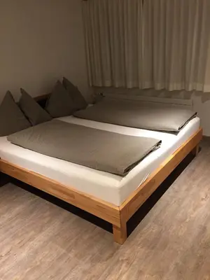 Ein Bett oder Betten in einem Zimmer der Unterkunft Chalet Grünegg