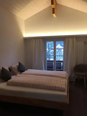Ein Bett oder Betten in einem Zimmer der Unterkunft Chalet Grünegg