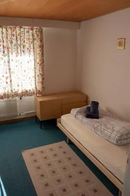 Ein Bett oder Betten in einem Zimmer der Unterkunft Chalet Caroline