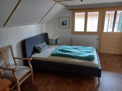 Ein Bett oder Betten in einem Zimmer der Unterkunft Chalet Bärenhaus