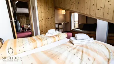 Ein Bett oder Betten in einem Zimmer der Unterkunft Haus Caroline, Riederalp Mitte