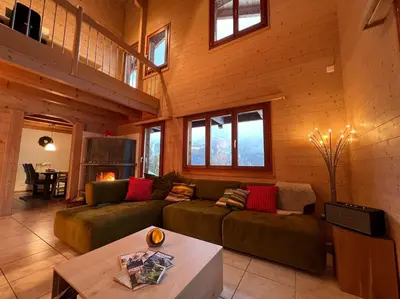 Ein Sitzbereich in der Unterkunft Chalet Luisa