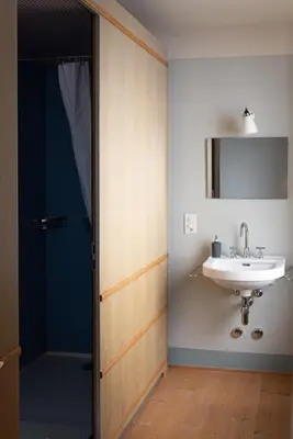 Ein Badezimmer in der Unterkunft Grand Hotel du Cervin - Auberge de jeunesse et spa