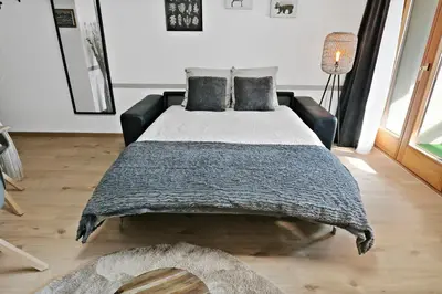 Ein Bett oder Betten in einem Zimmer der Unterkunft Nouveau studio avec vue imprenable sur la vallée