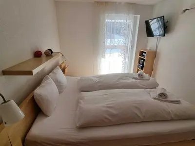 Ein Bett oder Betten in einem Zimmer der Unterkunft Modern and bright apartment opposite ski-lift