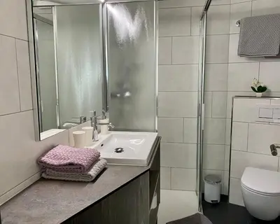 Ein Badezimmer in der Unterkunft ALCAZAR apartments