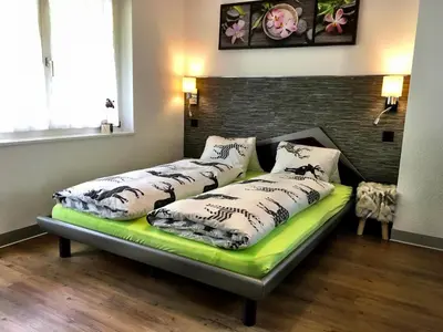 Ein Bett oder Betten in einem Zimmer der Unterkunft ALCAZAR apartments