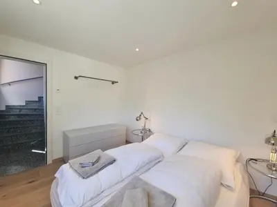 Ein Bett oder Betten in einem Zimmer der Unterkunft Duplex Apartment Bella Coppia