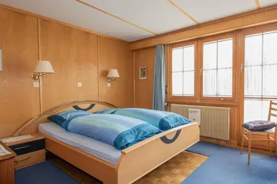Ein Bett oder Betten in einem Zimmer der Unterkunft Chalet Grimm