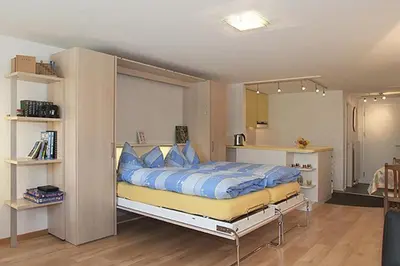 Ein Bett oder Betten in einem Zimmer der Unterkunft Adler 87