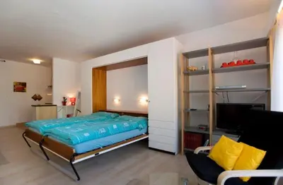 Ein Bett oder Betten in einem Zimmer der Unterkunft Adler 69