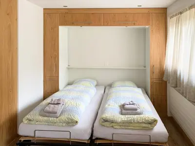 Ein Bett oder Betten in einem Zimmer der Unterkunft Splendid modern studio in the heart of Zermatt