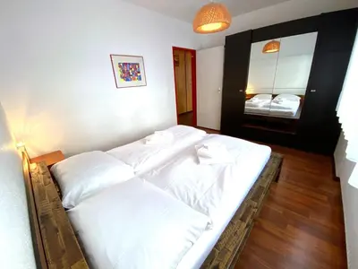 Ein Bett oder Betten in einem Zimmer der Unterkunft Adler 66