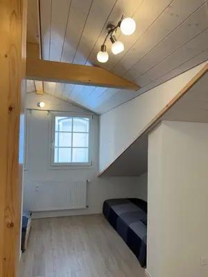 Ein Bett oder Betten in einem Zimmer der Unterkunft Esencial Apartment Interlaken