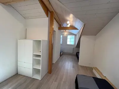 Ein Bett oder Betten in einem Zimmer der Unterkunft Esencial Apartment Interlaken