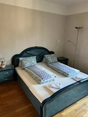 Ein Bett oder Betten in einem Zimmer der Unterkunft SAVOY 26