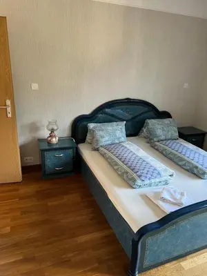 Ein Bett oder Betten in einem Zimmer der Unterkunft SAVOY 26
