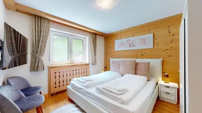 Ein Bett oder Betten in einem Zimmer der Unterkunft Cosy apartment surrounded by nature in Varen - Salgesch region