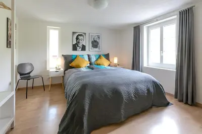 Ein Bett oder Betten in einem Zimmer der Unterkunft Spirit Apartments - Balkon mit Seesicht - Parkplatz
