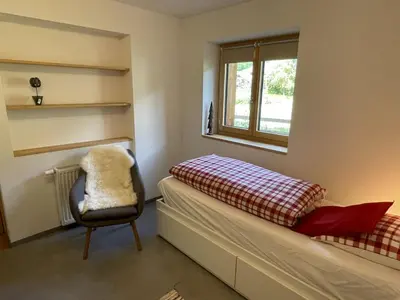 Ein Bett oder Betten in einem Zimmer der Unterkunft Apartment Ilse EG Süd-West by Interhome