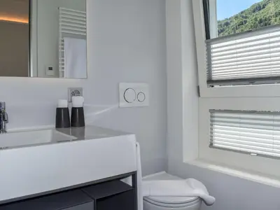 Ein Badezimmer in der Unterkunft Apartment Capriccio 16 Pergola by Interhome