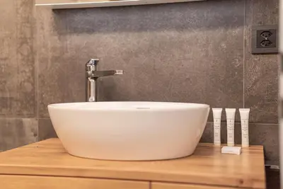 Ein Badezimmer in der Unterkunft Haus Beta by Zermatt Premium Apartments