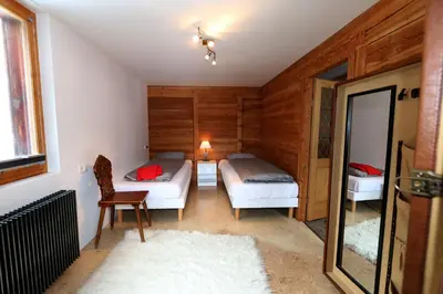 Ein Bett oder Betten in einem Zimmer der Unterkunft Stegmatte - Unique luxury triplex apartment for 10 persons