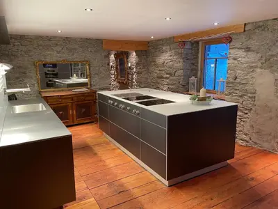 Küche/Küchenzeile in der Unterkunft Stegmatte - Unique luxury triplex apartment for 10 persons