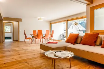 Ein Sitzbereich in der Unterkunft Eiger Panoramica - Aare Jungfrau AG