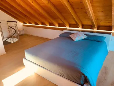 Ein Bett oder Betten in einem Zimmer der Unterkunft Casa Mille Sassi