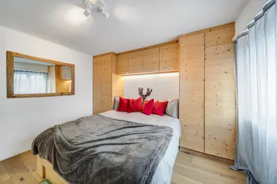 Ein Bett oder Betten in einem Zimmer der Unterkunft In the heart of Crans, fireplace and parking