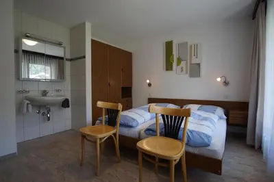 Ein Bett oder Betten in einem Zimmer der Unterkunft Haus Amor
