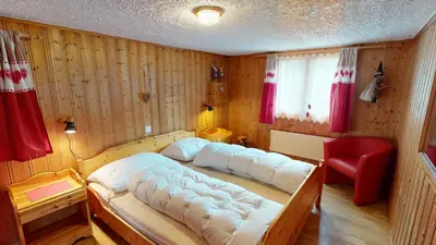 Ein Bett oder Betten in einem Zimmer der Unterkunft Rosenhof RH1