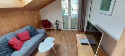 Ein Sitzbereich in der Unterkunft Chalet Sunnmätteli