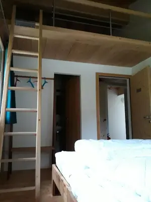 Ein Bett oder Betten in einem Zimmer der Unterkunft Gasthaus Heiligkreuz