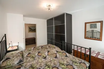 Ein Bett oder Betten in einem Zimmer der Unterkunft Charming Appartment in Zermatt - 