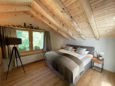 Ein Bett oder Betten in einem Zimmer der Unterkunft Oasis-Zermatt