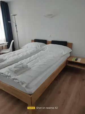 Ein Bett oder Betten in einem Zimmer der Unterkunft Herberge Balmweid 1