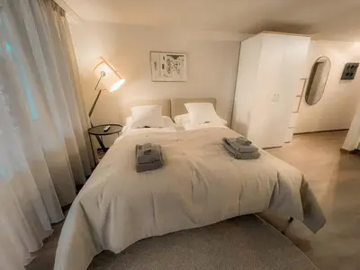 Ein Bett oder Betten in einem Zimmer der Unterkunft Studio modern & ruhig, Nähe Gondel by ZermattStays