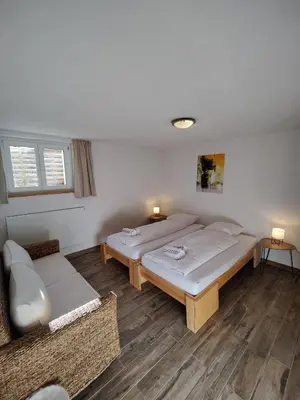 Ein Bett oder Betten in einem Zimmer der Unterkunft Hubel Apartment 14