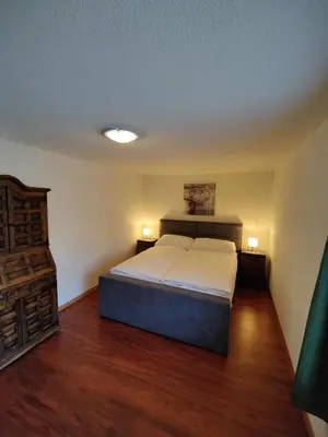 Ein Bett oder Betten in einem Zimmer der Unterkunft Hubel Apartment 14