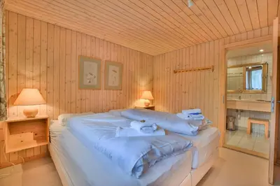 Ein Bett oder Betten in einem Zimmer der Unterkunft Chalet Arnica