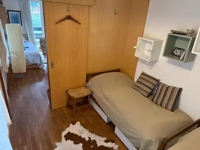 Ein Bett oder Betten in einem Zimmer der Unterkunft 2-Zimmer Studio mit grossem Balkon und Bergpanorama - 400m von Talstation Sillerenbahn
