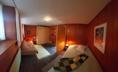 Ein Bett oder Betten in einem Zimmer der Unterkunft Ferienwohnung-Brienz