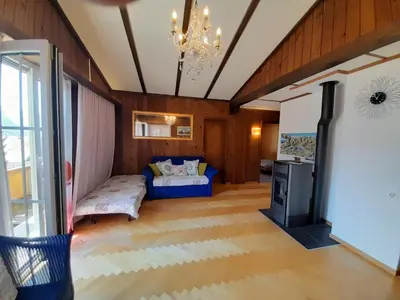 Ein Bett oder Betten in einem Zimmer der Unterkunft Cozy Chalet by Interlaken. Parking