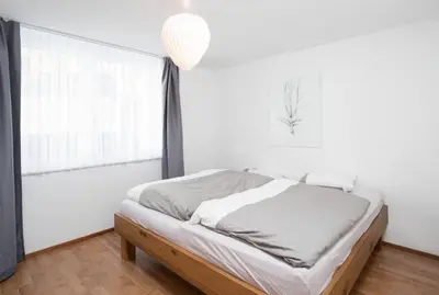 Ein Bett oder Betten in einem Zimmer der Unterkunft Big and chique Matterhorn view apartment 4 per.