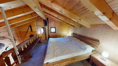 Ein Bett oder Betten in einem Zimmer der Unterkunft Walliserhüs WH0